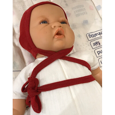 BabyHäubchen "Engels rot-melange", 100% Wolle (kbT), rot-meliert